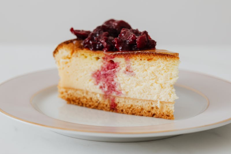 Classic New York cheesecake with berry compote